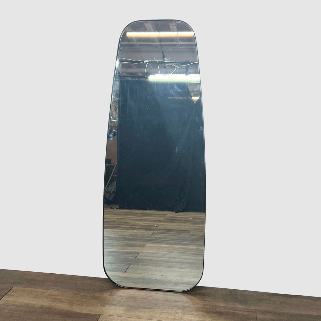 Elegant CB2 Elroy Mirror with walnut frame, suitable for vertical or horizontal hang.