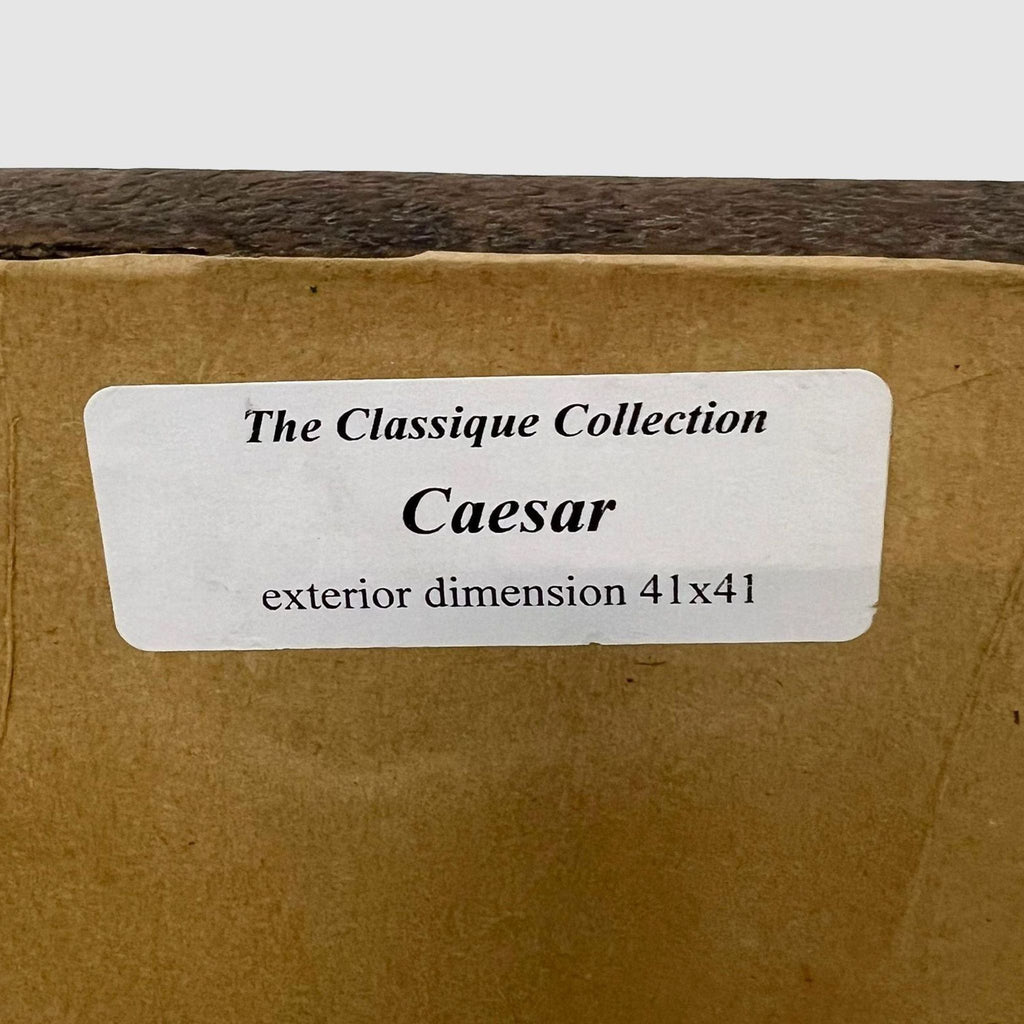 3. "Label on Caesar mirror's back with text 'The Classique Collection Caesar, exterior dimension 41x41'."