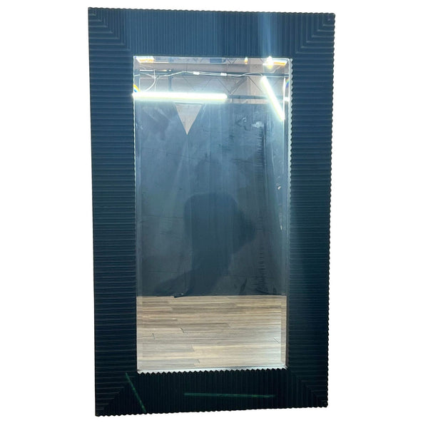 Textured black-framed full-length mirror by Reperch, can be hung vertically or horizontally.