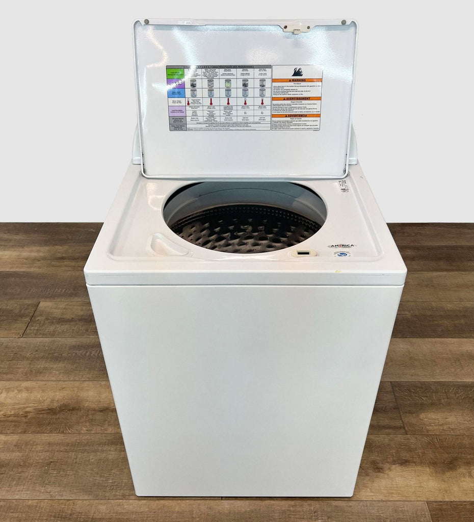 2. Interior view of a Whirlpool high-efficiency washer with lid open, showing impeller and washing instructions.