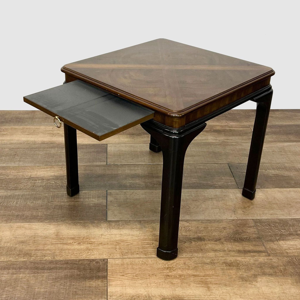 2. Dark brown Reperch square end table with drawer partially open, showcasing interior space on wooden floor.