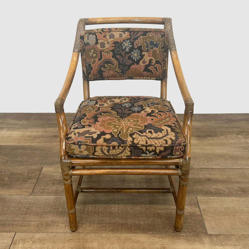 Dining chair by McGuire with woven bamboo design and removable cushions.