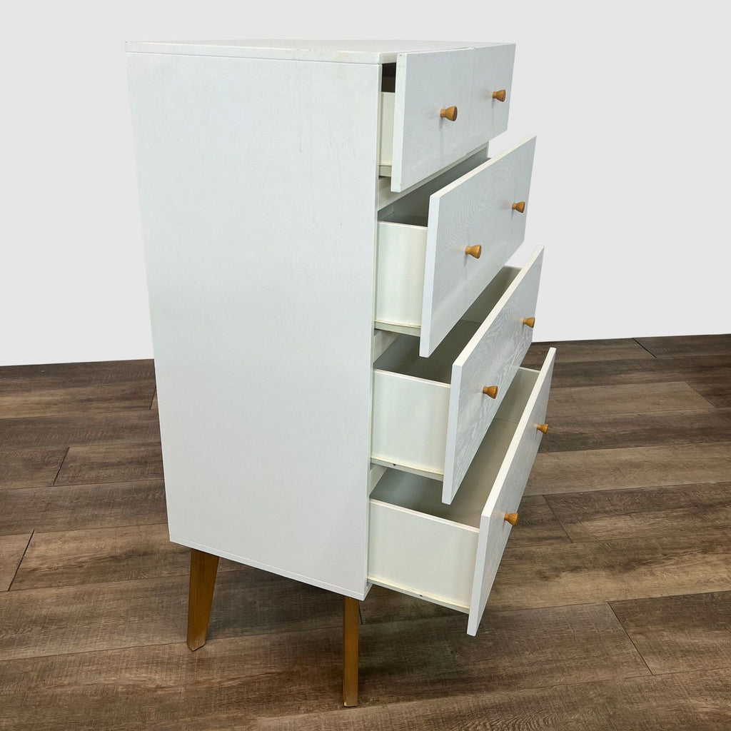 Side view of open drawers on West Elm mid-century dresser.