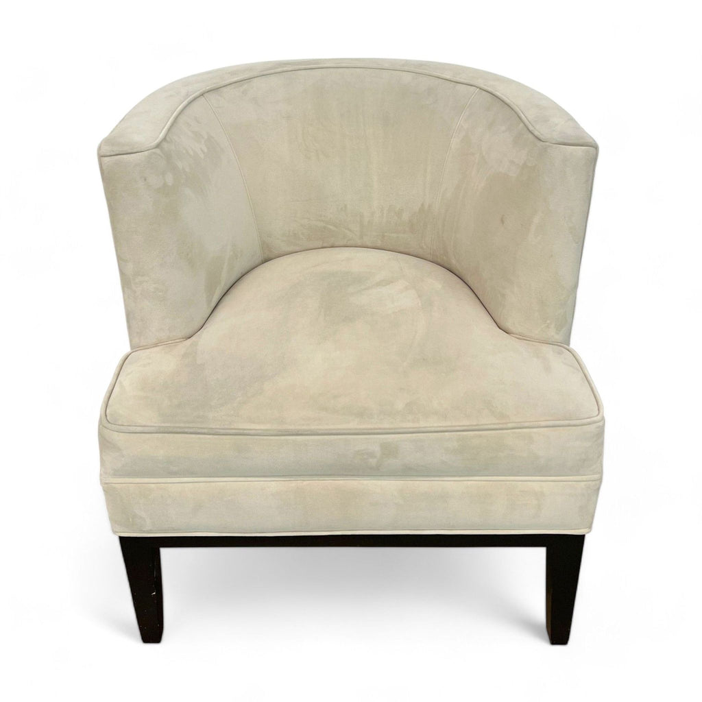 1. "A front-facing view of a Reperch beige velvet accent chair with a barrel back and dark wood legs."