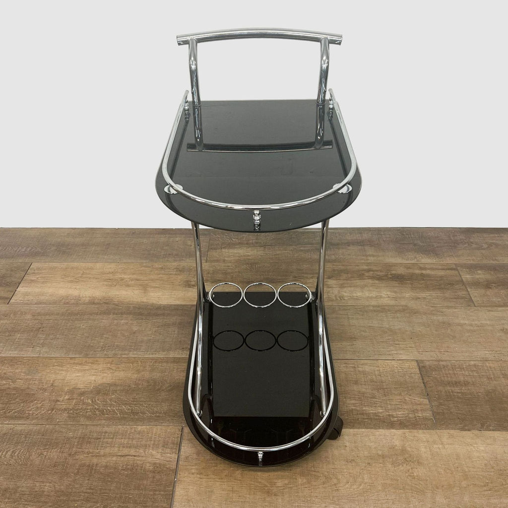 Sleek black and steel Orren Ellis serving cart with glass shelving and bottle storage, pictured from above.