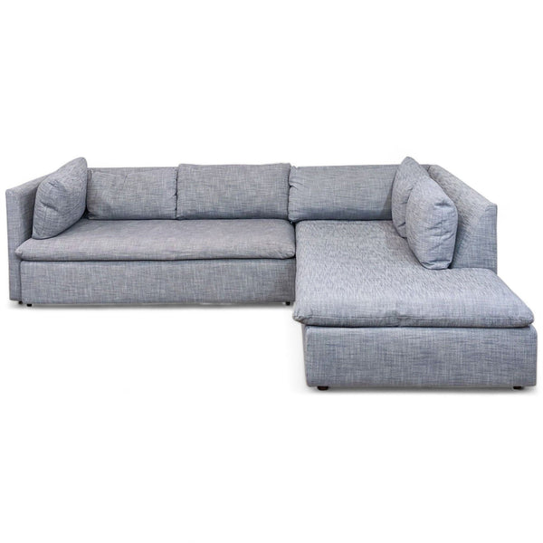 West Elm Shelter sectional sofa in graphite linen weave with chaise lounge and plush back cushions.