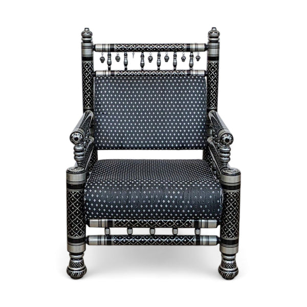1. Reperch Sankheda straight-backed armchair with a cube-like structure, showcasing black and silver lacquer finish and tiered spindle pattern.