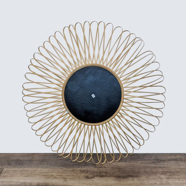 1. "CB2 Mick wall mirror with a sunburst design composed of natural rattan and bamboo, encircling a central 14-inch mirror."