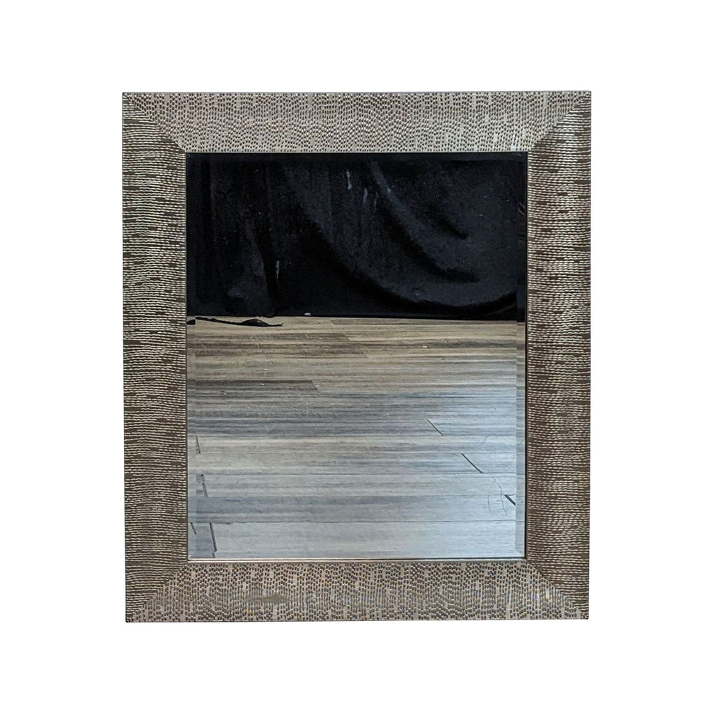 Sheffield Home wall mirror with a textured metallic finish frame, presented on a plain background.