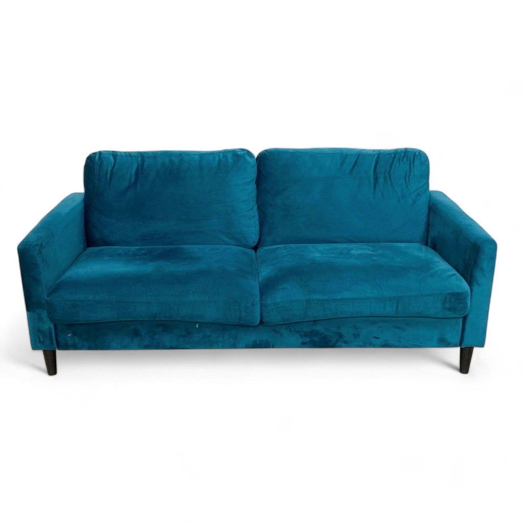 1. The Winston Loveseat by Mr. Kate, upholstered in teal velvet with solid wood legs, viewed from the front.