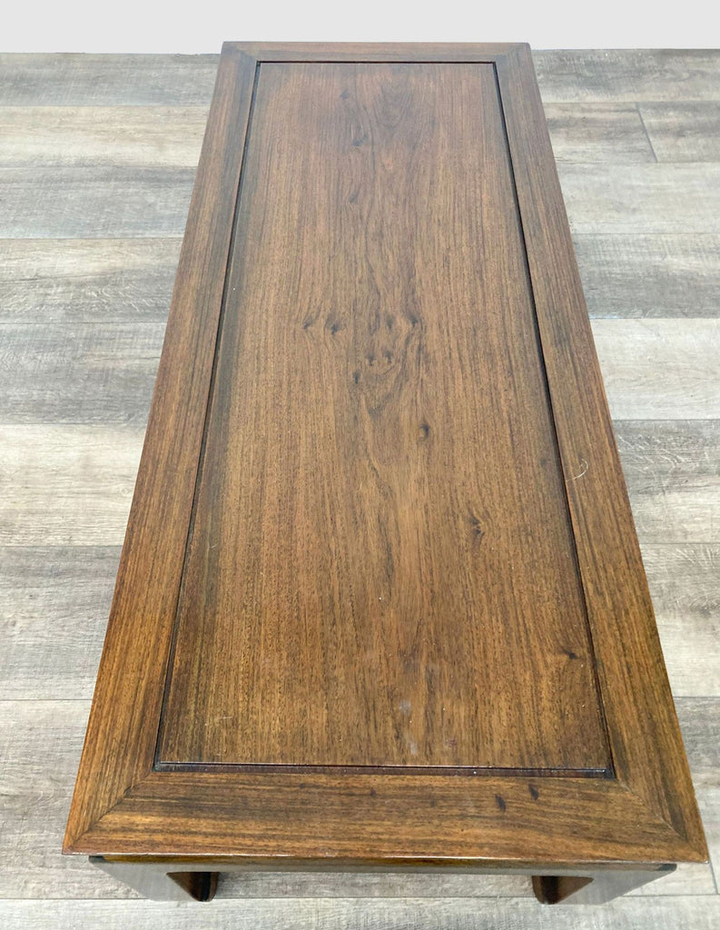 Top view of Reperch coffee table highlighting the wood grain and smooth surface.