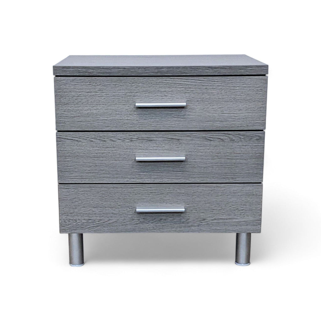 1. Ana Furniture brand end table with three drawers and silver handles on a white background.