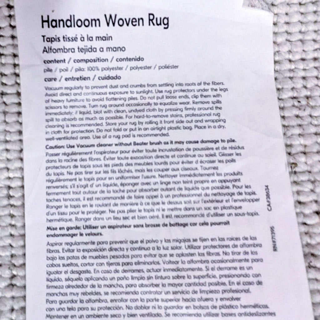 3. Care instructions for the West Elm Painted Strata Rug, detailing its 100% polyester composition and hand-loomed construction.