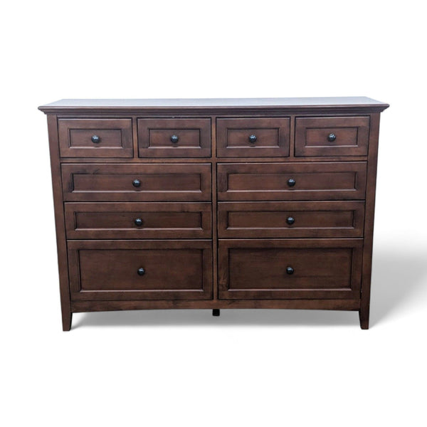 1. Solid alder hardwood McKenzie dresser by Whittier Wood Furniture with antique cherry finish and ten closed drawers.