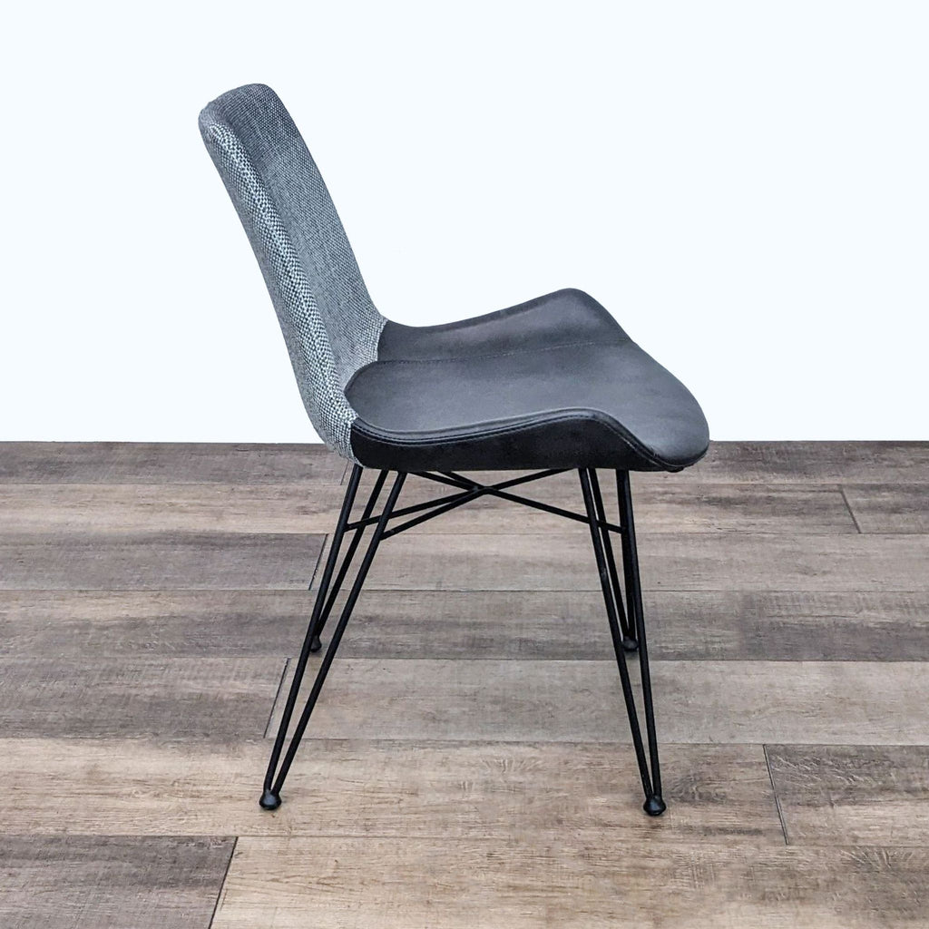 Frontal view of Alisa Dining Chair with grey fabric backrest and comfortable foam seat, by Euro Style.