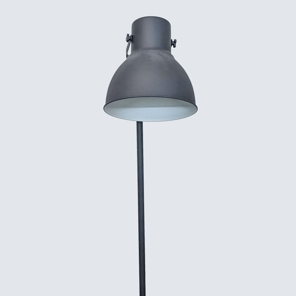 Elegant Reperch lighting fixture with a large dome-shaped grey lampshade and a slender stand.