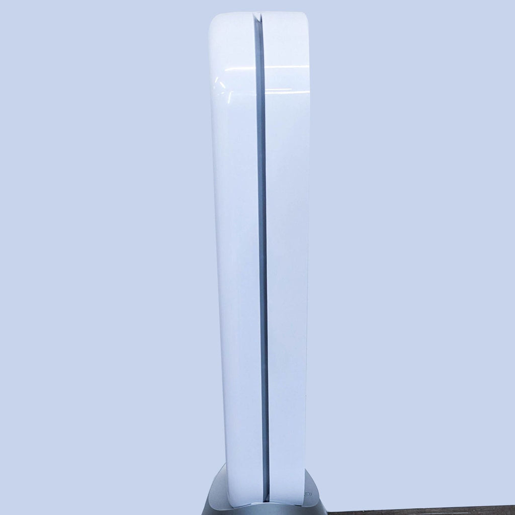 The Dyson tower fan seen from the front, emphasizing the slim profile and bladeless technology for uninterrupted airflow.