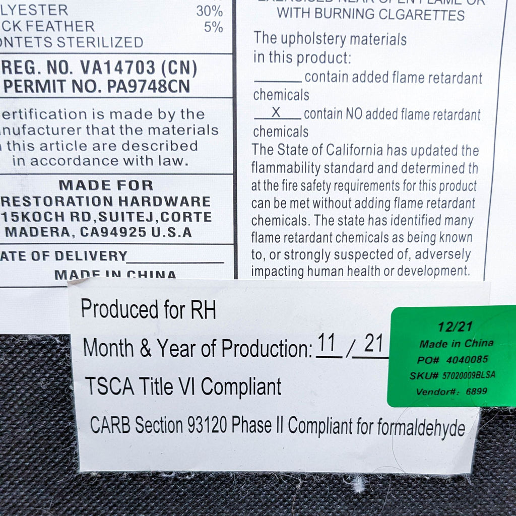 3. Label for Restoration Hardware furniture detailing compliance with safety standards, production date, and materials used.