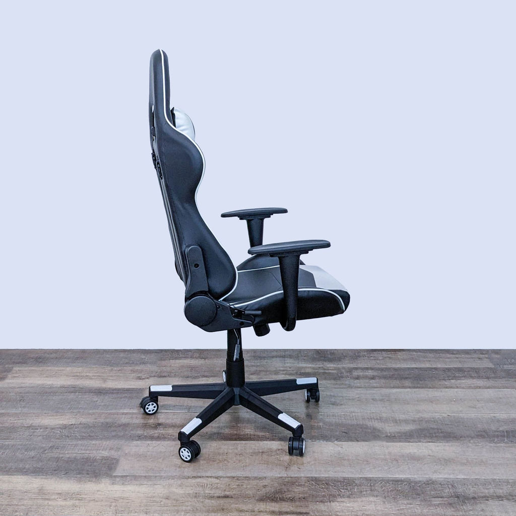Side view of Homall gaming chair showing slim profile, adjustable armrests, and ergonomic backing with height and tilt mechanisms.