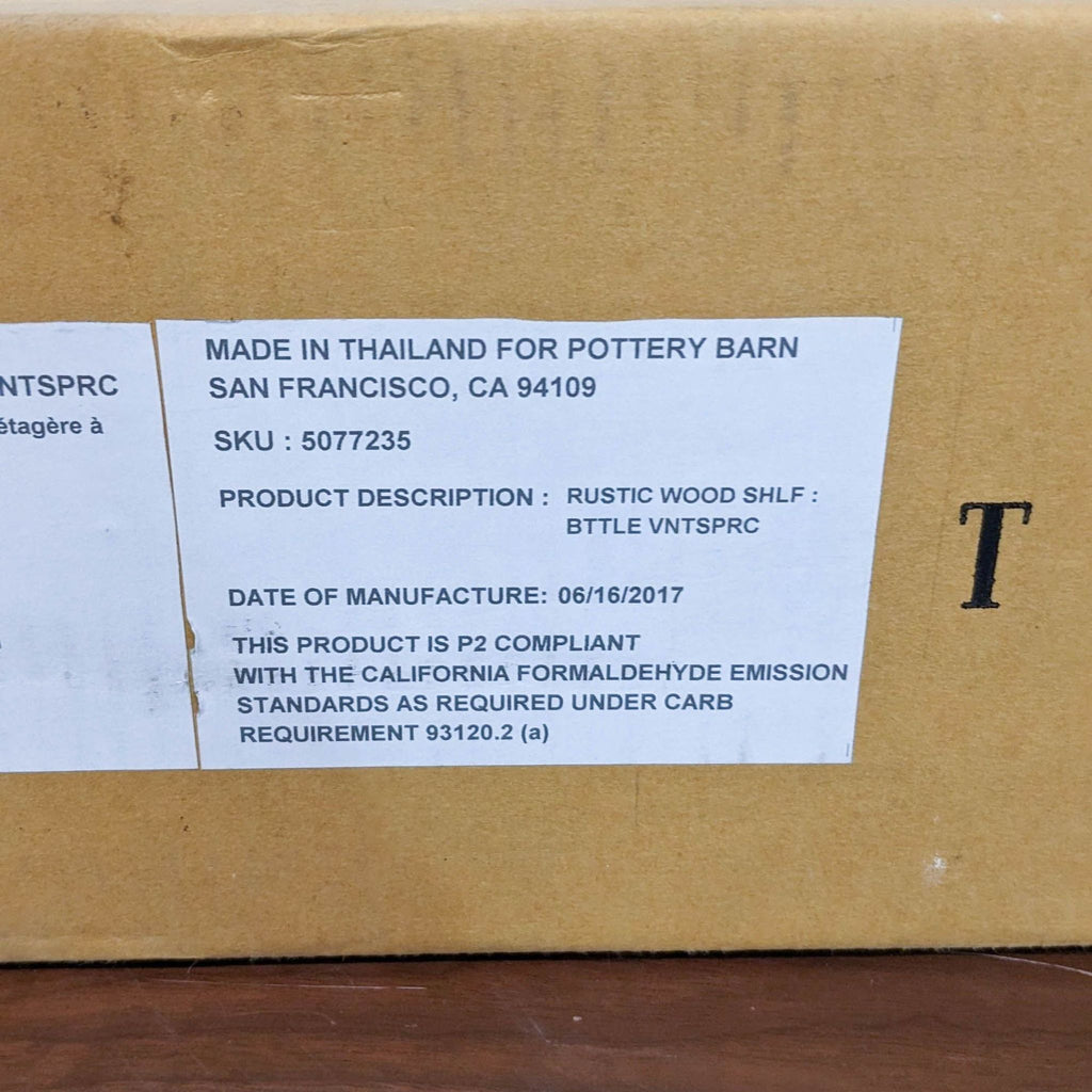 3. Close-up of a label on a Pottery Barn box detailing product SKU, description, and compliance info.