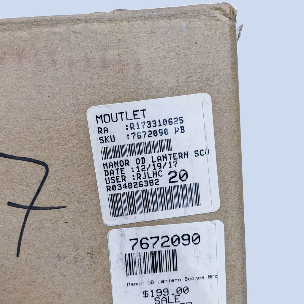 3. Close-up of a cardboard box label for a Pottery Barn Manor Outdoor Lantern Sconce with price and SKU information.