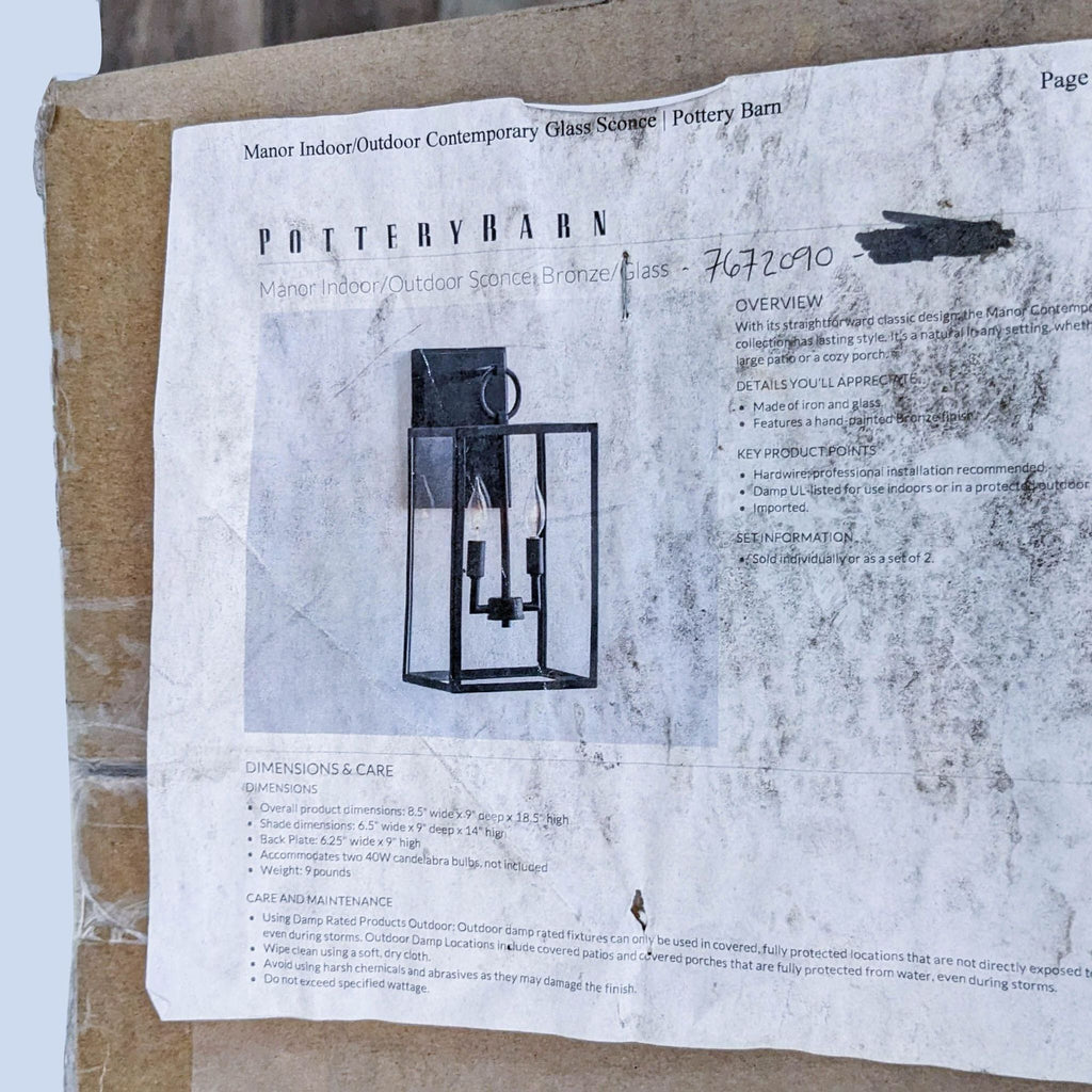 2. A weathered instruction label for a Pottery Barn bronze and glass indoor/outdoor contemporary wall sconce with a sketch.