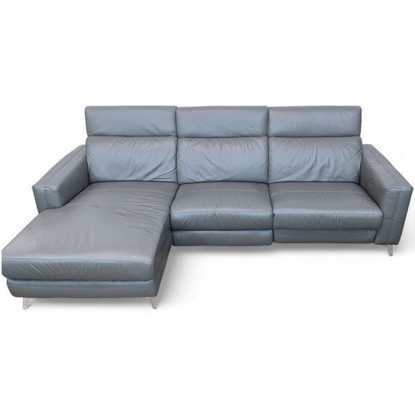 Ana sectional with chaise lounge, power reclining seat and headrests, metal legs, upholstered in grey leather.