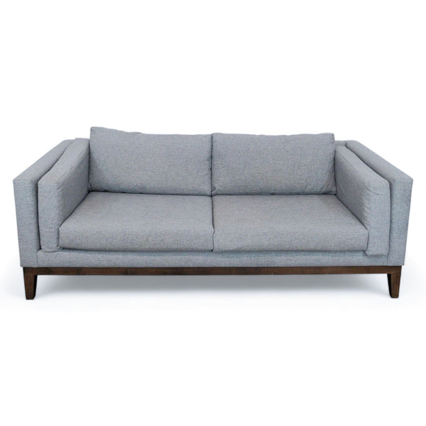 1. Heather gray Sofa Creations 3-seat couch with clean lines and sturdy wooden legs on a white background.