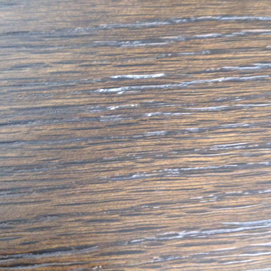 3. Close-up texture detail of the Living Spaces Pierce dresser's wood finish.