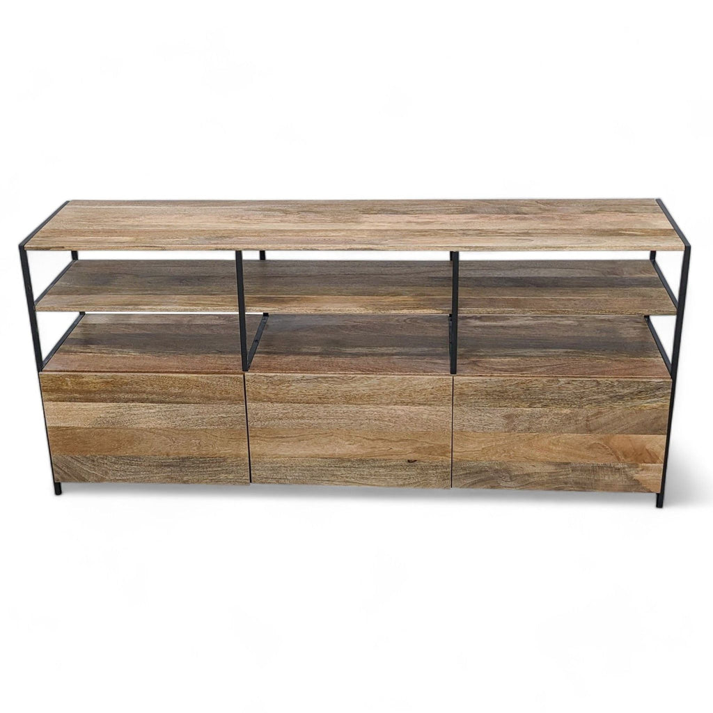 West Elm entertainment center with solid mango wood and blackened steel frame, closed view.