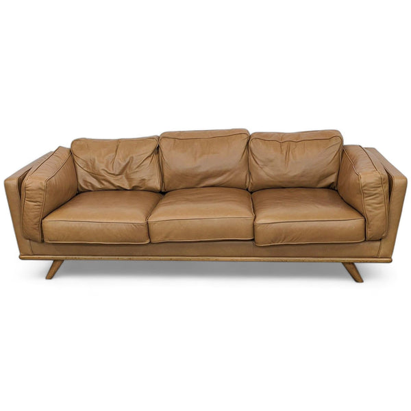 Article Timber sofa in Charme Tan, 3-seat with plush cushions and oak wood trim, mid-century design.