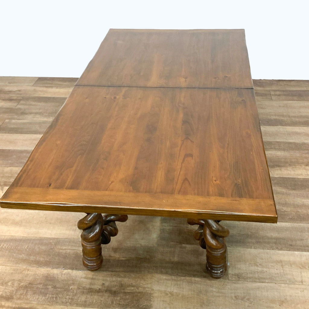 a pair of antique teak dining tables