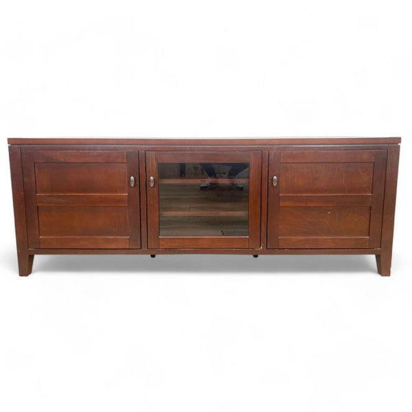Crate & Barrel wooden entertainment center with glass doors and storage compartments on white background.