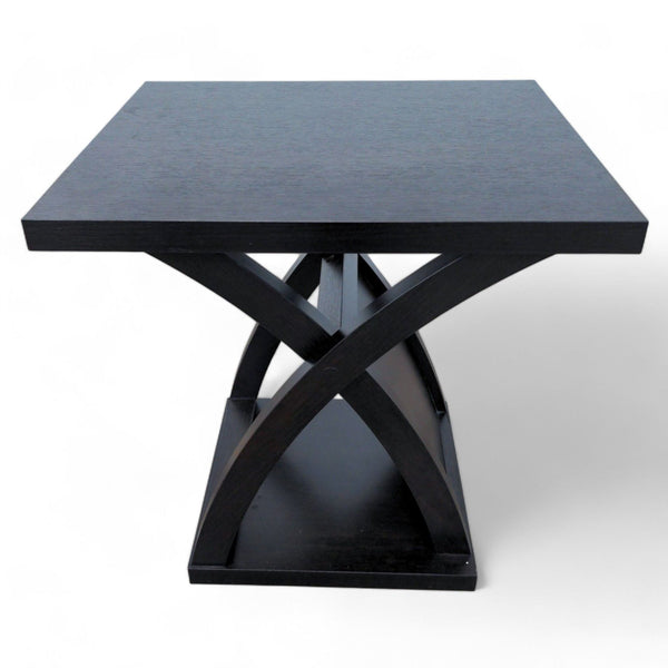 Wayfair end table with a modern black finish and cross-leg design.