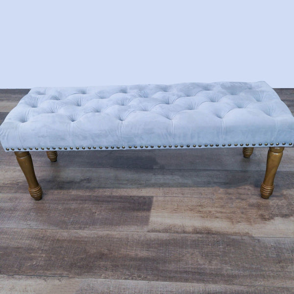 1. Grey velvet tufted ottoman by Reperch, with nailhead detailing on wooden legs, 48x18x17 inches.