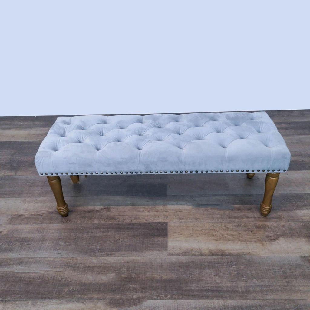 3. Luxurious grey velvet padded seat bench with tufting and nailhead trim, set on traditional wood legs, by Reperch.
