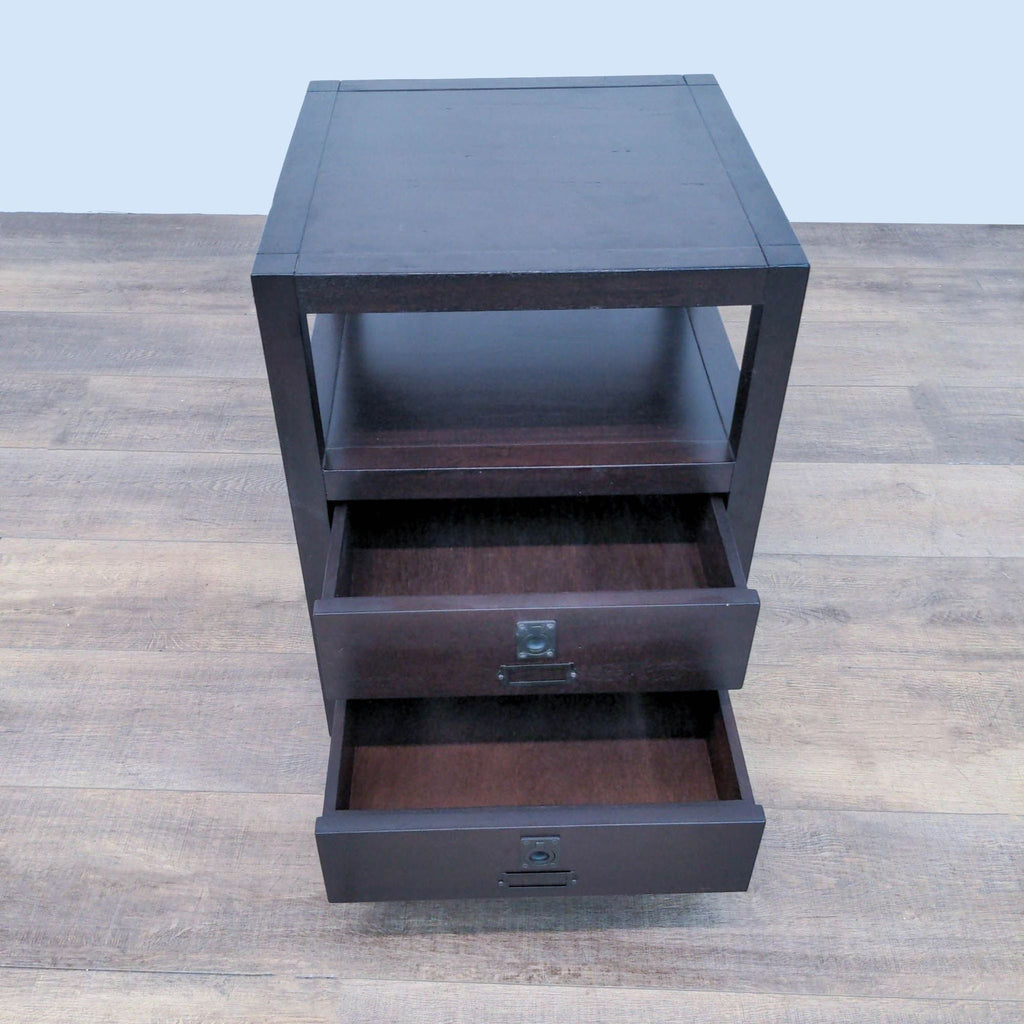 End table with open shelf and two drawers, featuring metal hardware.