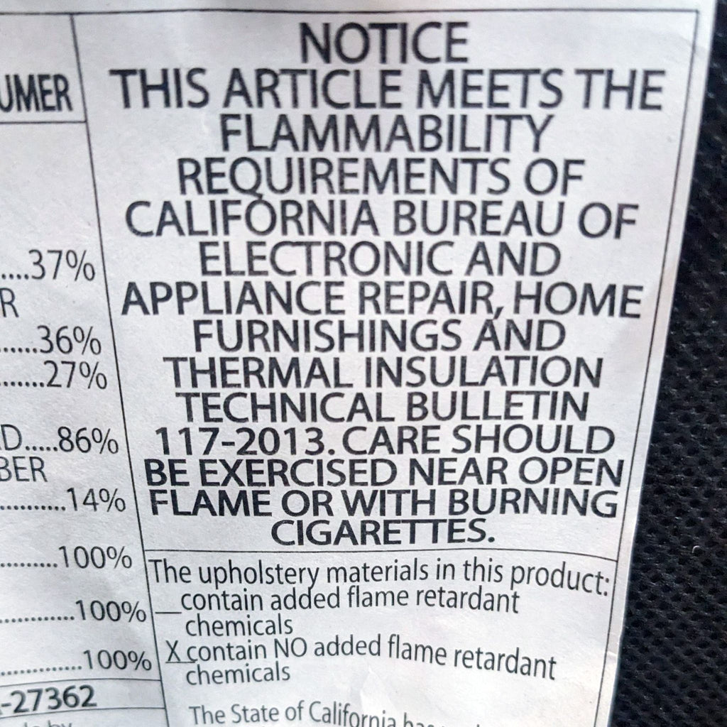 California's flammability notice tag for a blue microfiber lounge chair from Reperch.