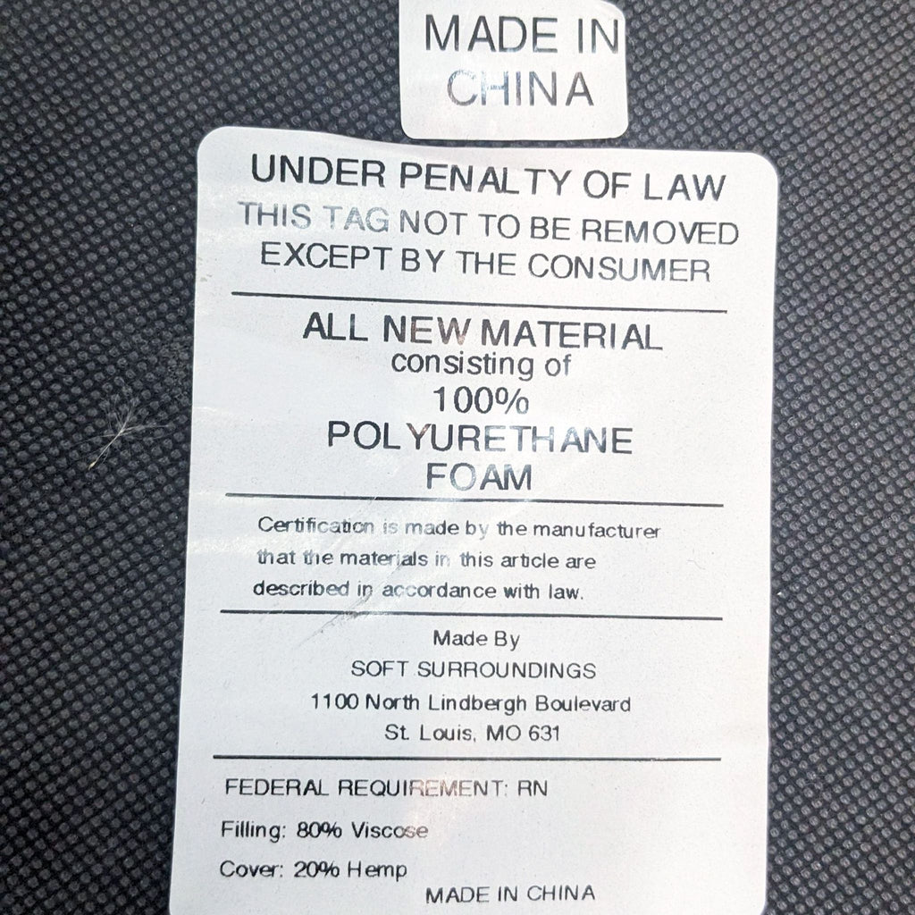 3. Close-up image of a furniture tag indicating materials as 100% polyurethane foam with cover details for a lounge chair, not showing the actual chair.