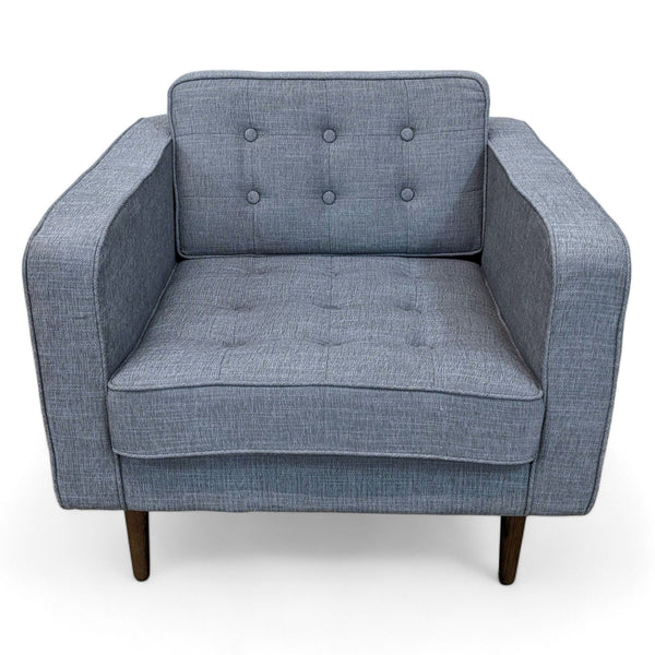 Modern Reperch lounge chair with tufted dark gray linen fabric and dark walnut legs, shown from the front.