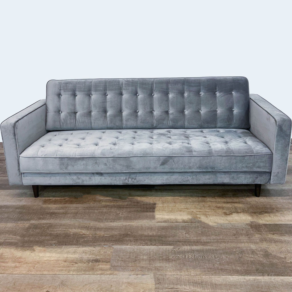 1. Juniper 3-seat sofa by Diamond Sofa with contemporary design, velvet upholstery, button tufting, and wooden feet, shown in frontal view.