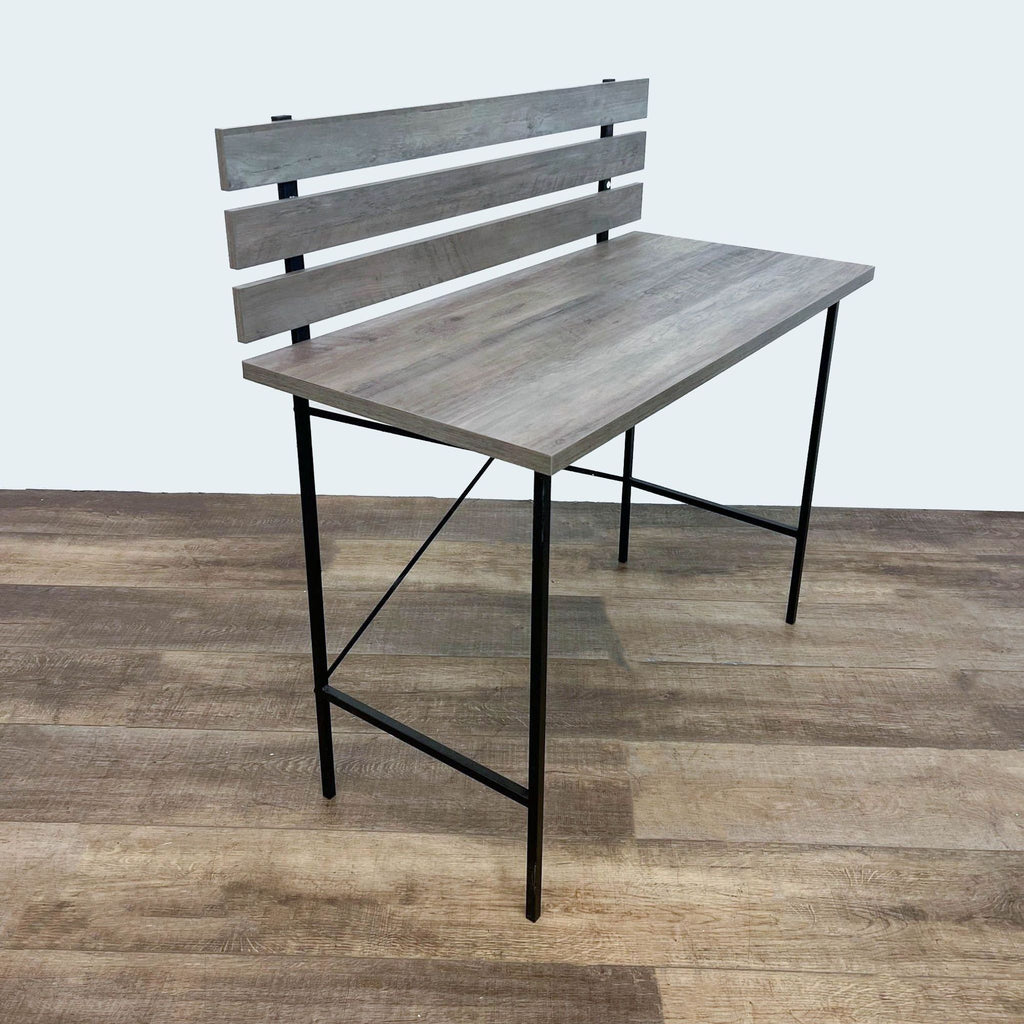 Wooden Reperch bench with gray finish, slat back design, and X-shaped metal base.