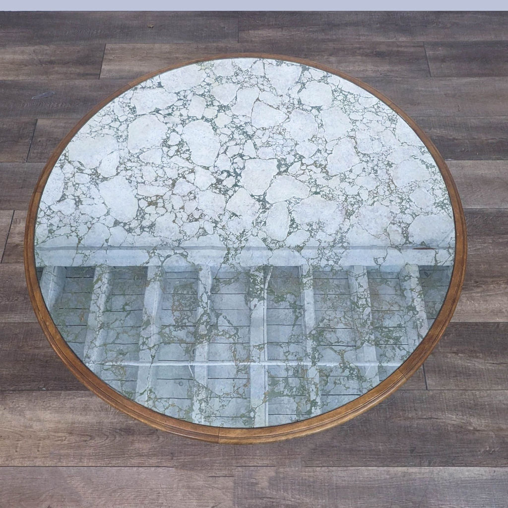 a round marble coffee table in the style of [ unused0 ]