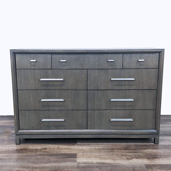 Rachael Ray Home Highline Dresser in Greige, featuring multiple drawers with silver handles on a wooden floor.
