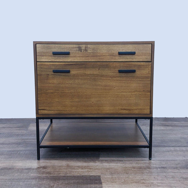 Hollis filing cabinet featuring acacia veneers with black steel frame and two closed drawers. Brand: Living Spaces.