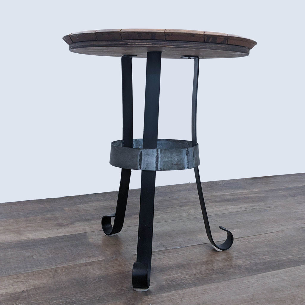 Side & Console Table by Saury, displaying curved iron legs and metal barrel brace, profile view.