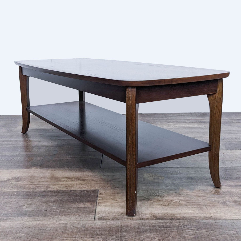 Contemporary Reperch coffee table with spacious top and secondary shelf, on a hardwood surface.