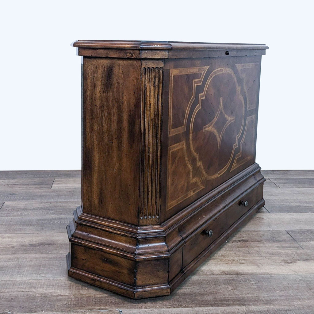 2. Side view of Reperch wood-carved entertainment center, highlighting ornate inlay patterns and corner detailing.