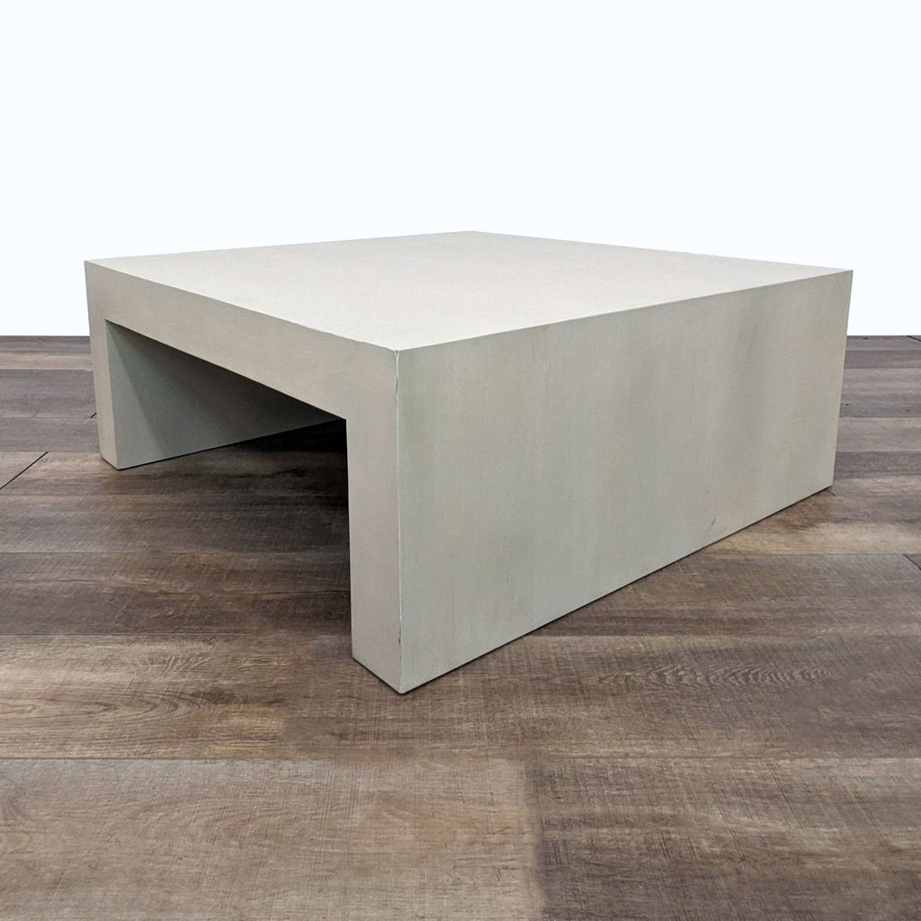 2. Solid mango wood coffee table by Diamond Sofa in a natural finish displayed at an angled side view on a wooden floor.