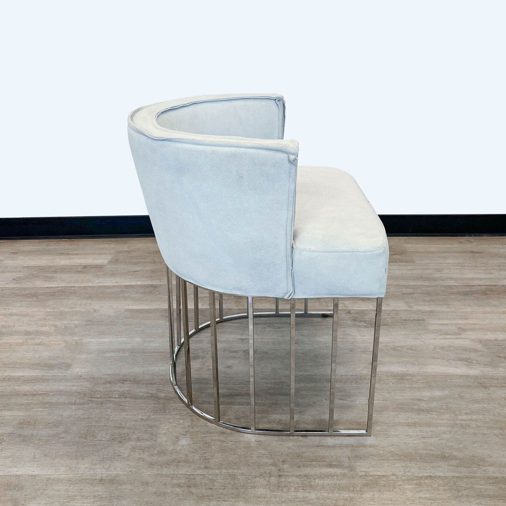 Side perspective of Reperch's suede-upholstered Modern Taylor chair with a metal base.